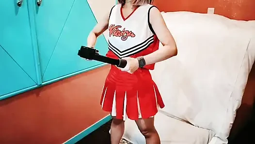 A cute, busty married woman does exercise 1 in an erotic cheerleader costume. Home made amateur Private Shoot