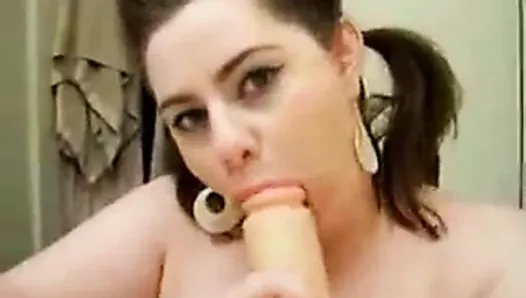 Chubby Slut Sucking A Dildo