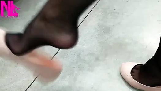 Dangling in Rose Ballet Flats in a Store