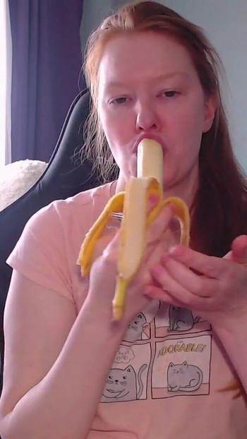 Key moment from "It's time for a sweet snack! This banana looks soooo much like your dick! Look how greedily I suck it!"