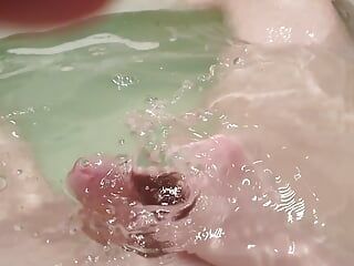 Masturbating and cumming in the bathtub
