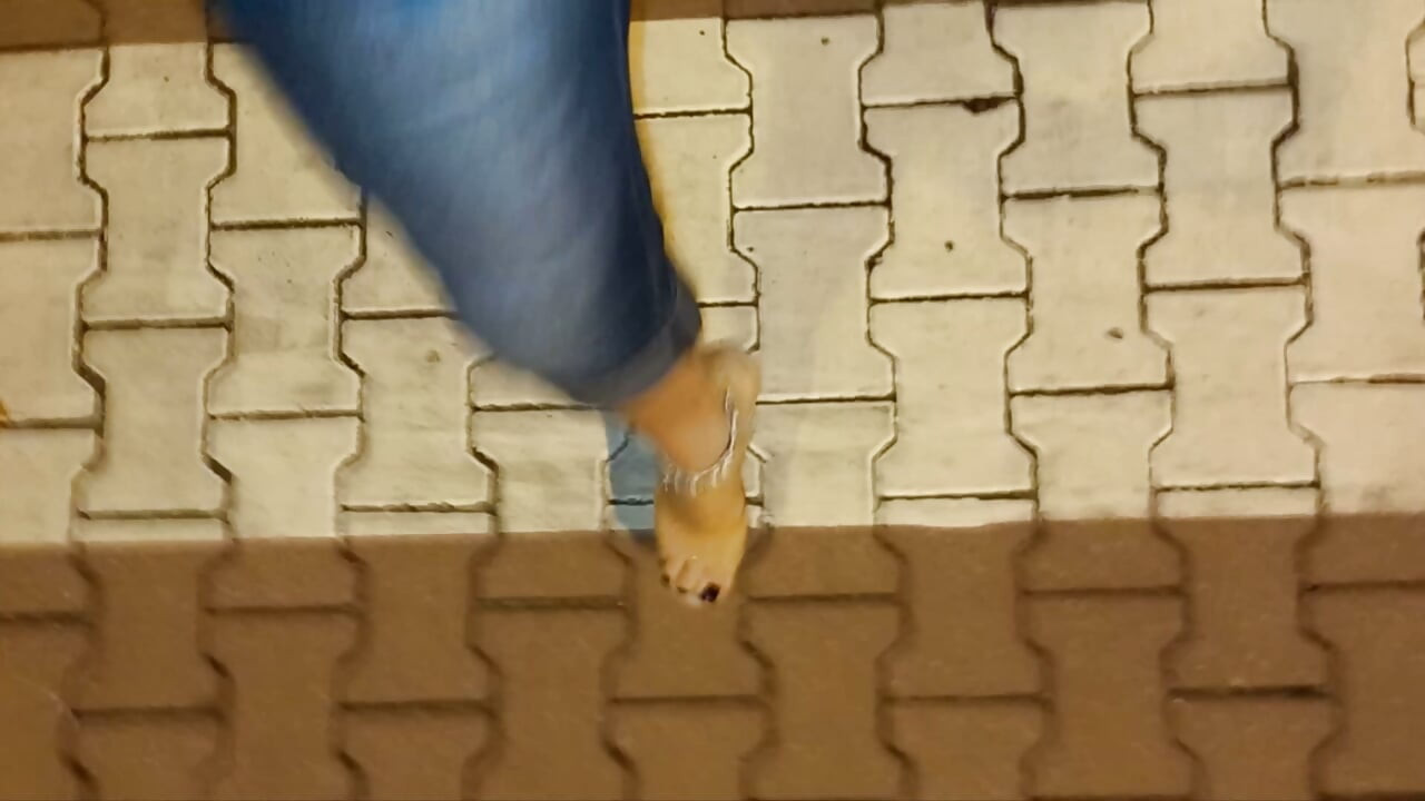 nighttime crossdressing on a public street in 20cm stripper heels, black toes, and black claws