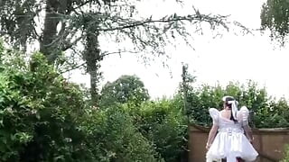 In an outfit with a short wedding dress with a layer for a day.