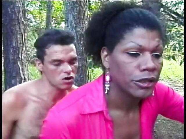 Tall black shemale Vinicius is fond of getting drilled for vegemite by white dude in the wood