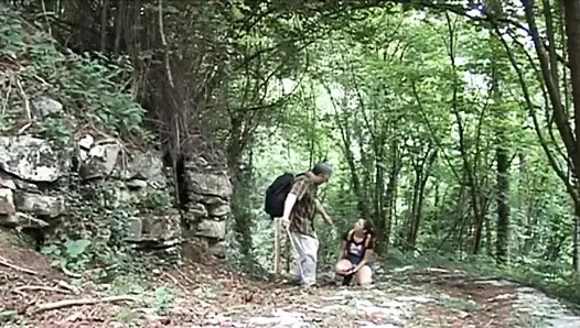 Naughty teen gets fucked by a mature guide in the woods