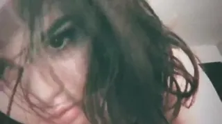 Selena Gomez selfie with nice cleavage, listing to Nirvana