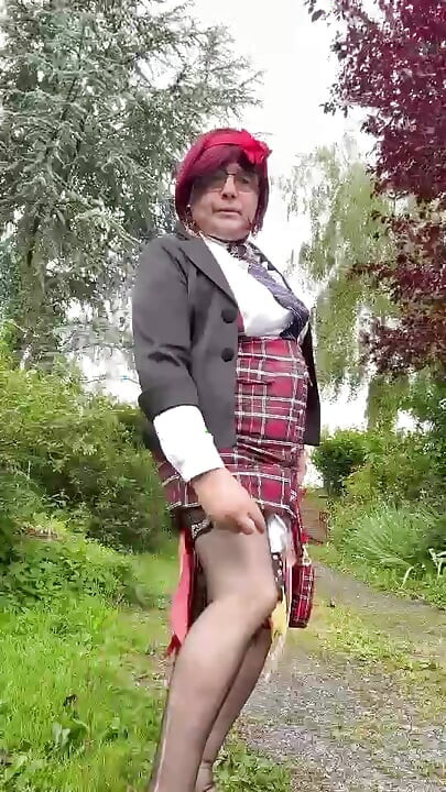 Dressed in a little plaid suspender skirt for an evening