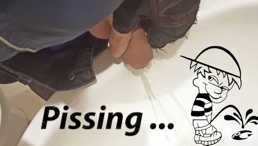 Teen in gloves pisses in the sink