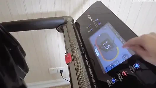 Mz24 - a Girl Bound to a Treadmill with Metal Restraints and Shackles