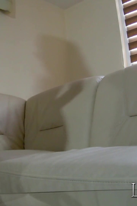Desperate brunette piss in a glass in living room