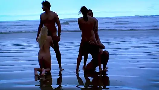 Big ass on the beach with several naked women having sex