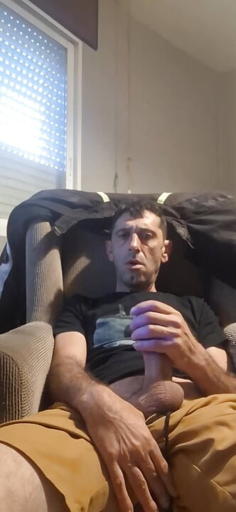 Guy masturbating on the sofa