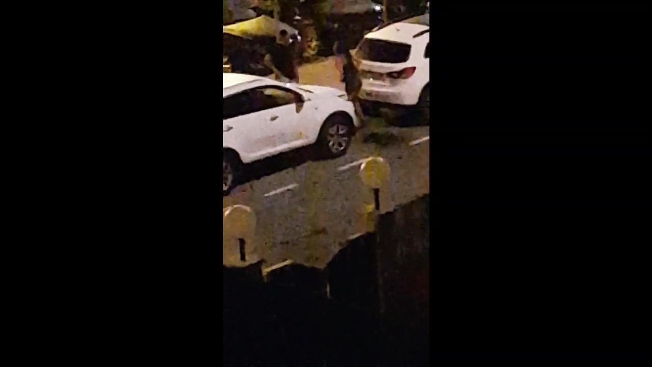 Woman strips and pisses in the street at 4am