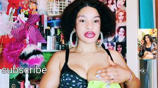 Pretty black woman massages big boobs for Youtube