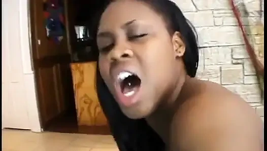 Sexy black babe sticks a vibrator on her friends wet pussy
