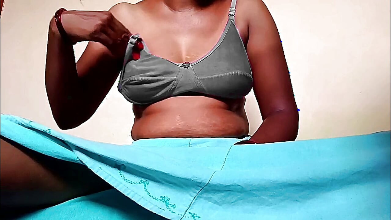 Ammu takes off her bra, squeezes her breasts, and gets in the mood 137