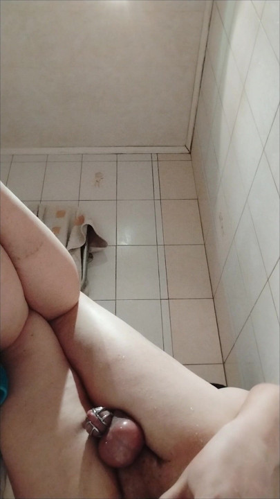 Fast cumshot in chastity cage