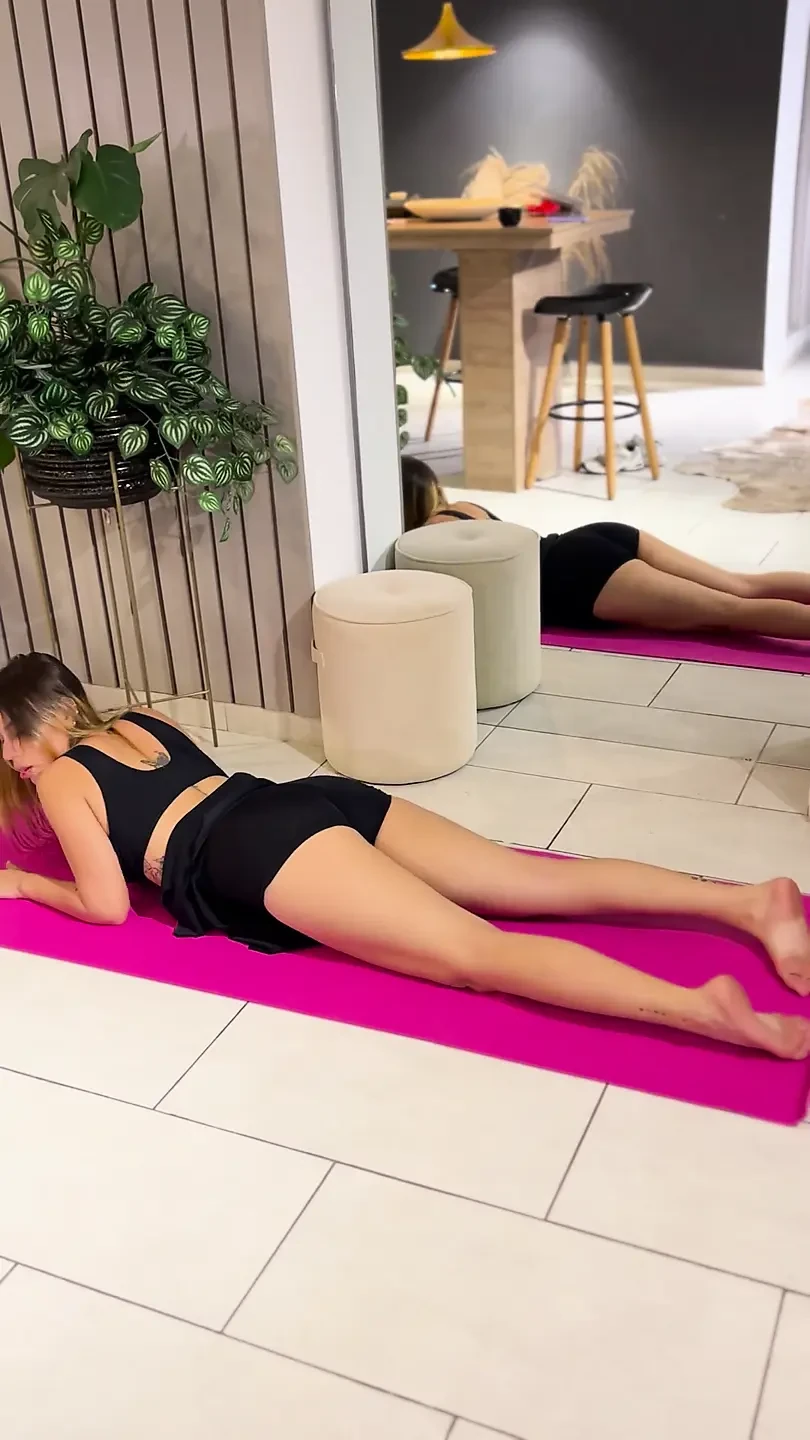 Petite Latina stretching out yoga
