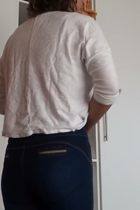 After Urinating, the Stepmother Puts on Very Tight Jeans, Revealing Her Panties