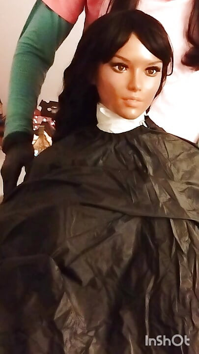Ebony sex doll Nikki wears barberette capes