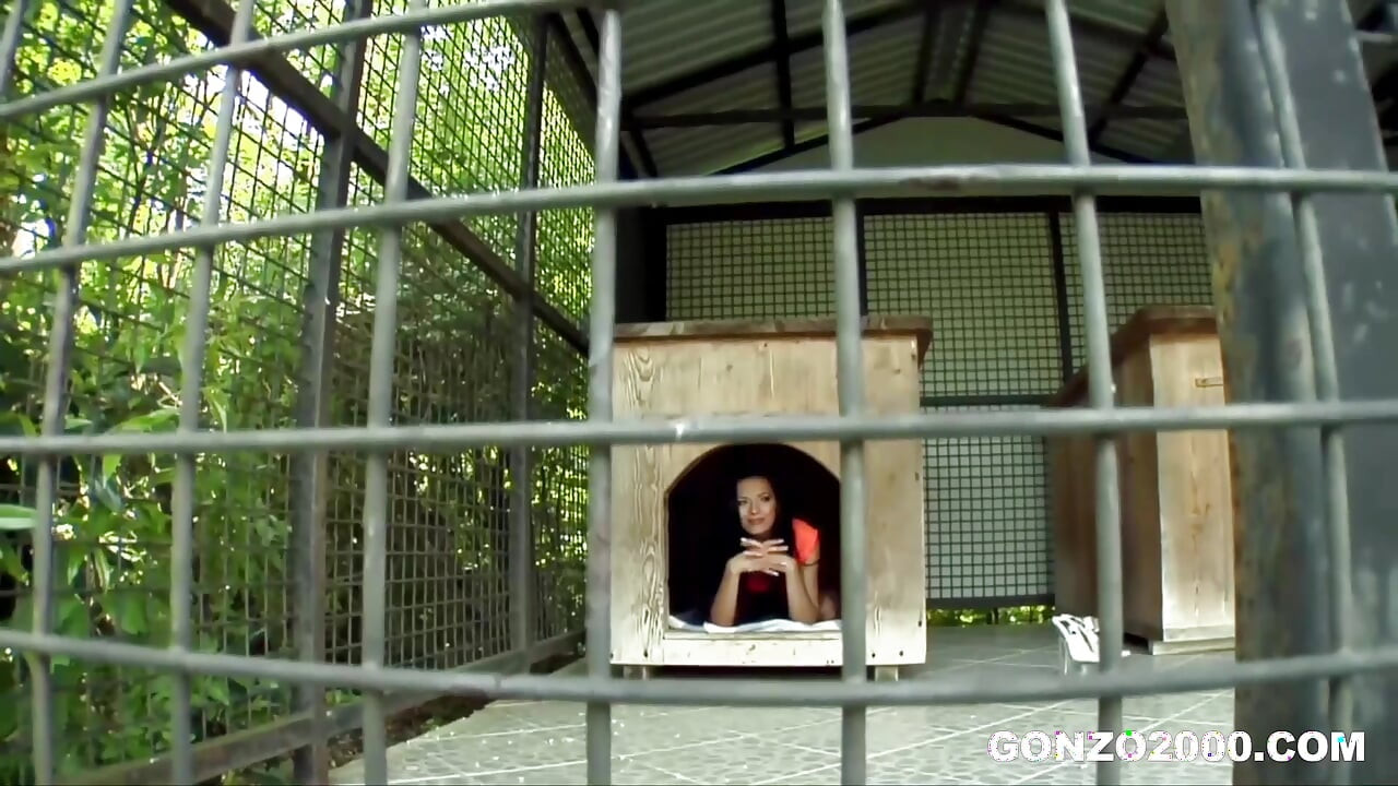 Mugur Mows the Lawn in Maid Outfit while Shalina is Locked in a Cage at Gonzo2000