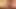 Redhead ladyboy in black dress spreads her hairy asshole in