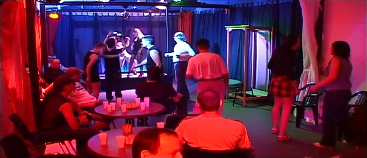 Blonde Babe Gangbanged by Horny Crowd in Wild Club Orgy