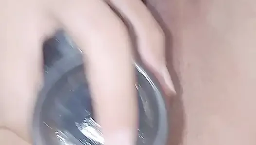 Horny asian teen fucks herself with a dildo