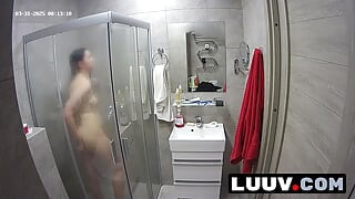 LUUV. A brunette showers, used to amateur cameras, showing her natural body