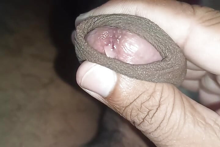 An Indian guy playing with his big cock