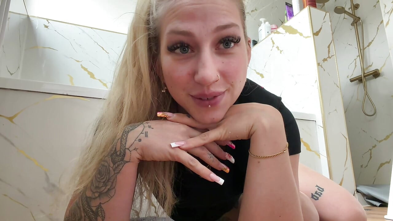 Blonde slut watched taking a shower