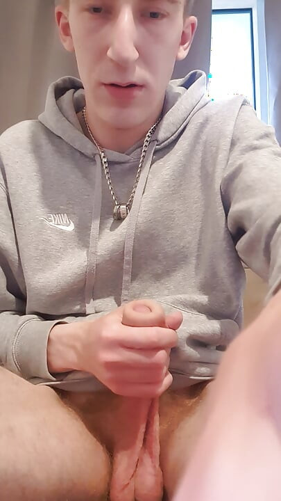 Skinny lad pulls back skin and shows bellend