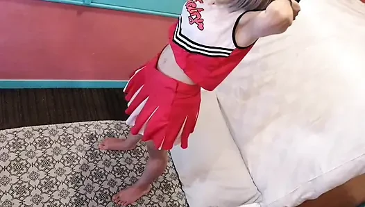A cute, busty married woman performs exercise 4 in an erotic cheerleader costume. Peeking down from above. Home made amateur Private Shoot
