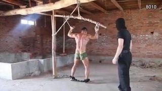 Chinese muscle guy gets whipped
