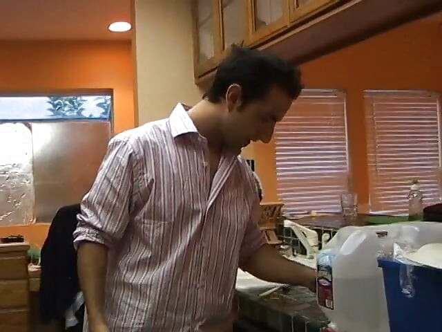 Young cutie has hot fuck in the kitchen with a stud