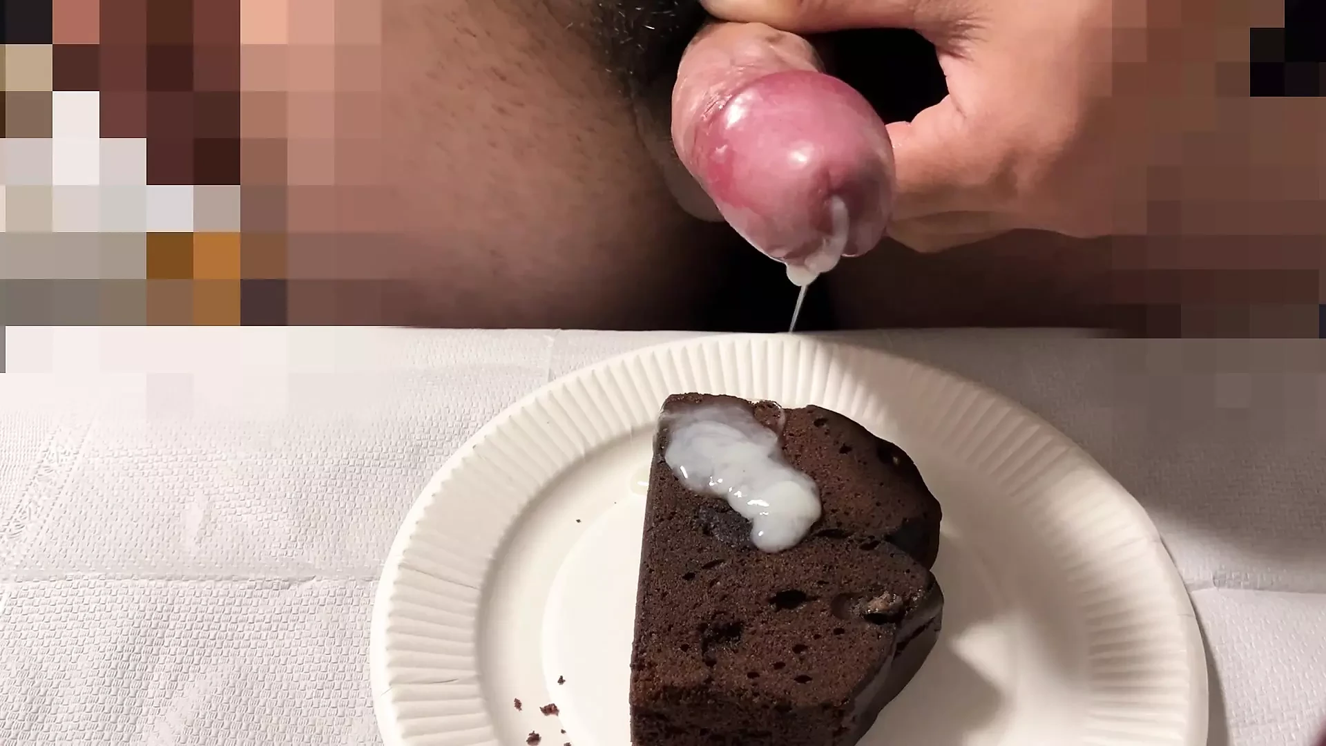 Ejakulera och äta läckra chokladbruna