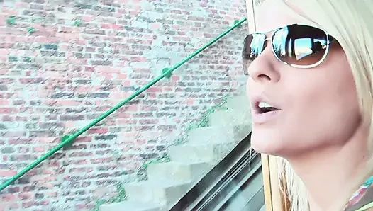 Busty Blonde MILF Drains Stranger Publicly for Voyeurs