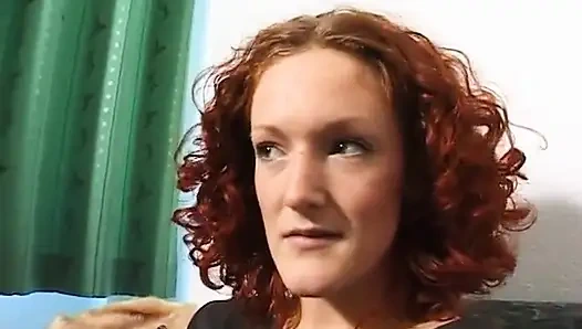 Cute redhead fingering her love hole