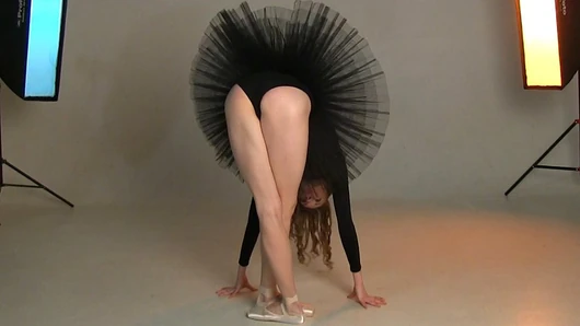 Flawless beauty ballerina Annett A with a flexible magnificent female body poses for me in a black stage costume. P-1(6)