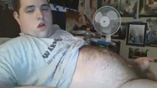 Big belly bear wanking on bed