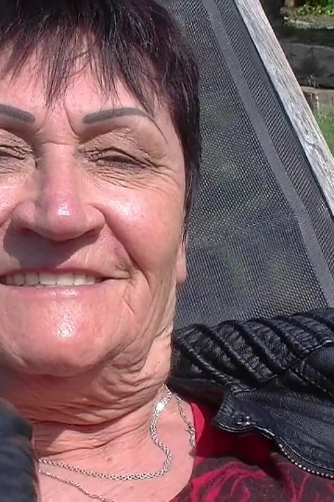Granny enjoys dildo in garden