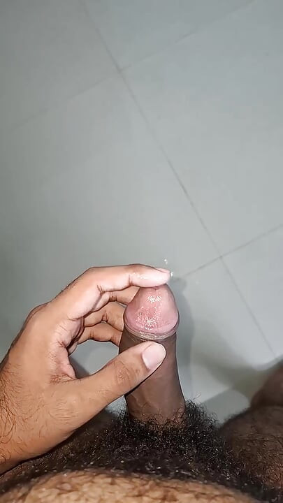 Hot hairy indian college guy strips, fingers ass hole, jerks his dick, moans and cums in his hostel room