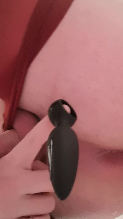 Butt plug and red pantyhose