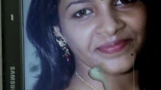 cumming on Saranya Nag yellow blouse and face