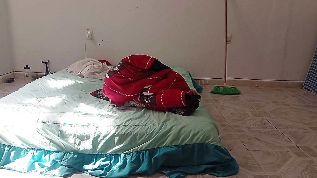Mexican mother-in-law cleaning guest room in thong