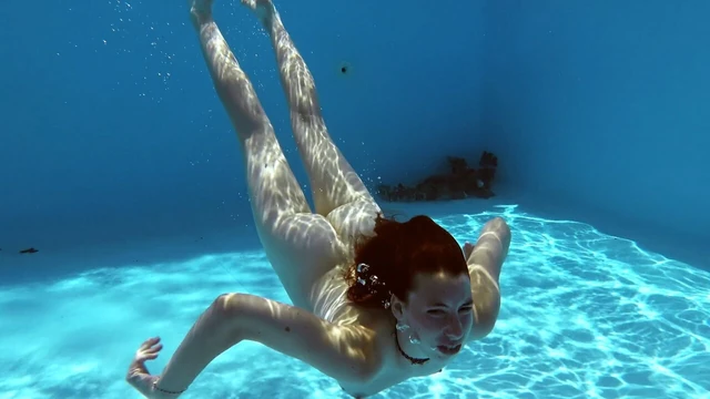 Fernanda Releve pink swimsuit gymnast in the pool