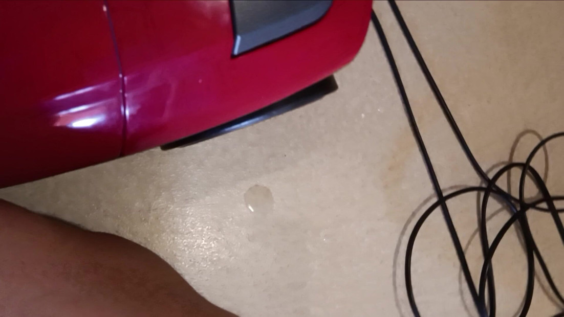 The lope bangs her vacuum cleaner