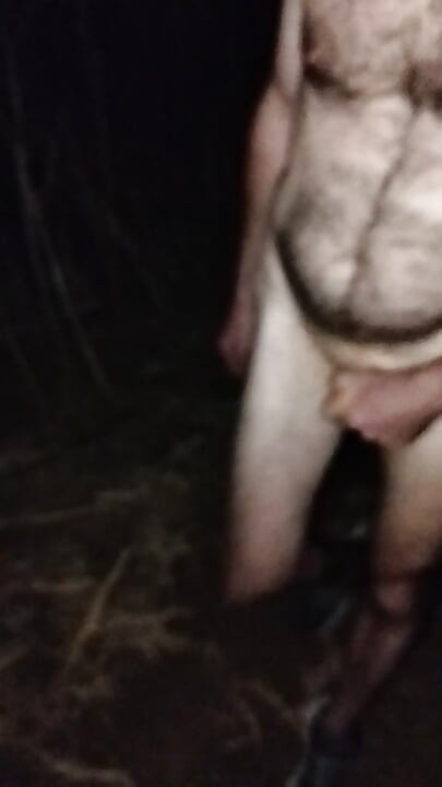 Naked walking on the hill along highway
