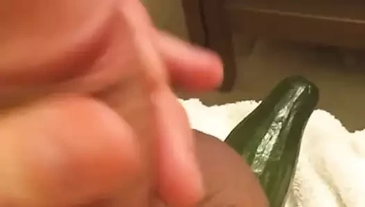 Masturbation with cucumber