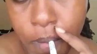 Kenian slut Aisha smoking cigarette hot